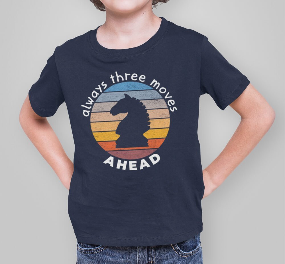 Kid wearing a t-shirt with the design 'Always three moves ahead'