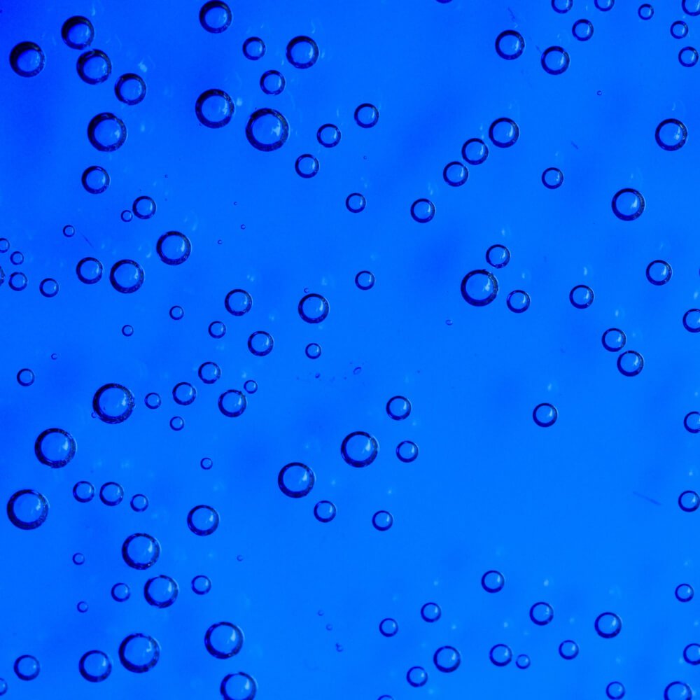 Bubbles scattered across a blue background